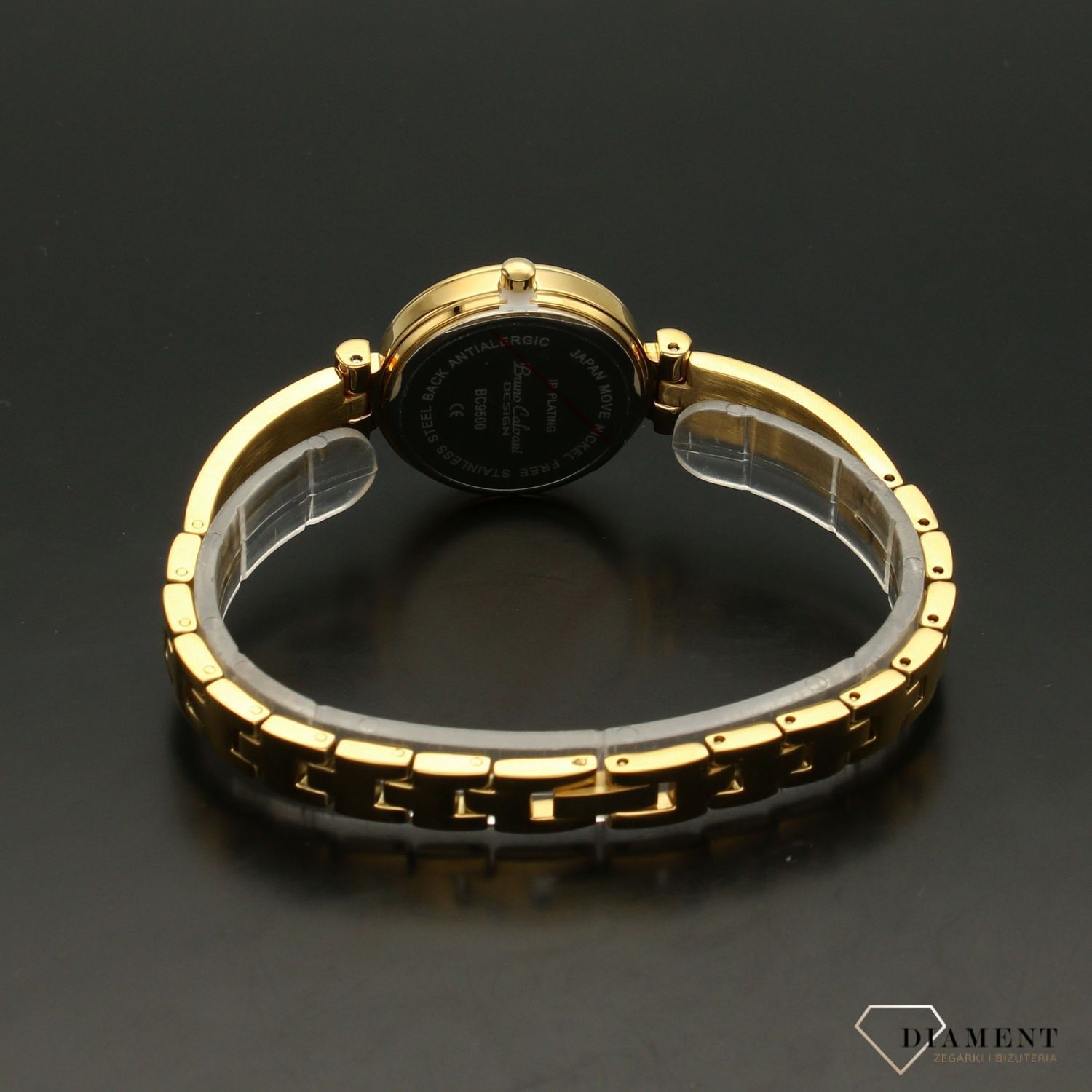 Zegarek damski Bruno Calvani BC9500 złoty perłowa tarcza. Zegarek damski w złotej kolorystyce z elegancką perłową tarczą. Tarcza zegarka z czarnymi cyframi arabskimi, nadaję całości świetnego kontrastu (2).jpg